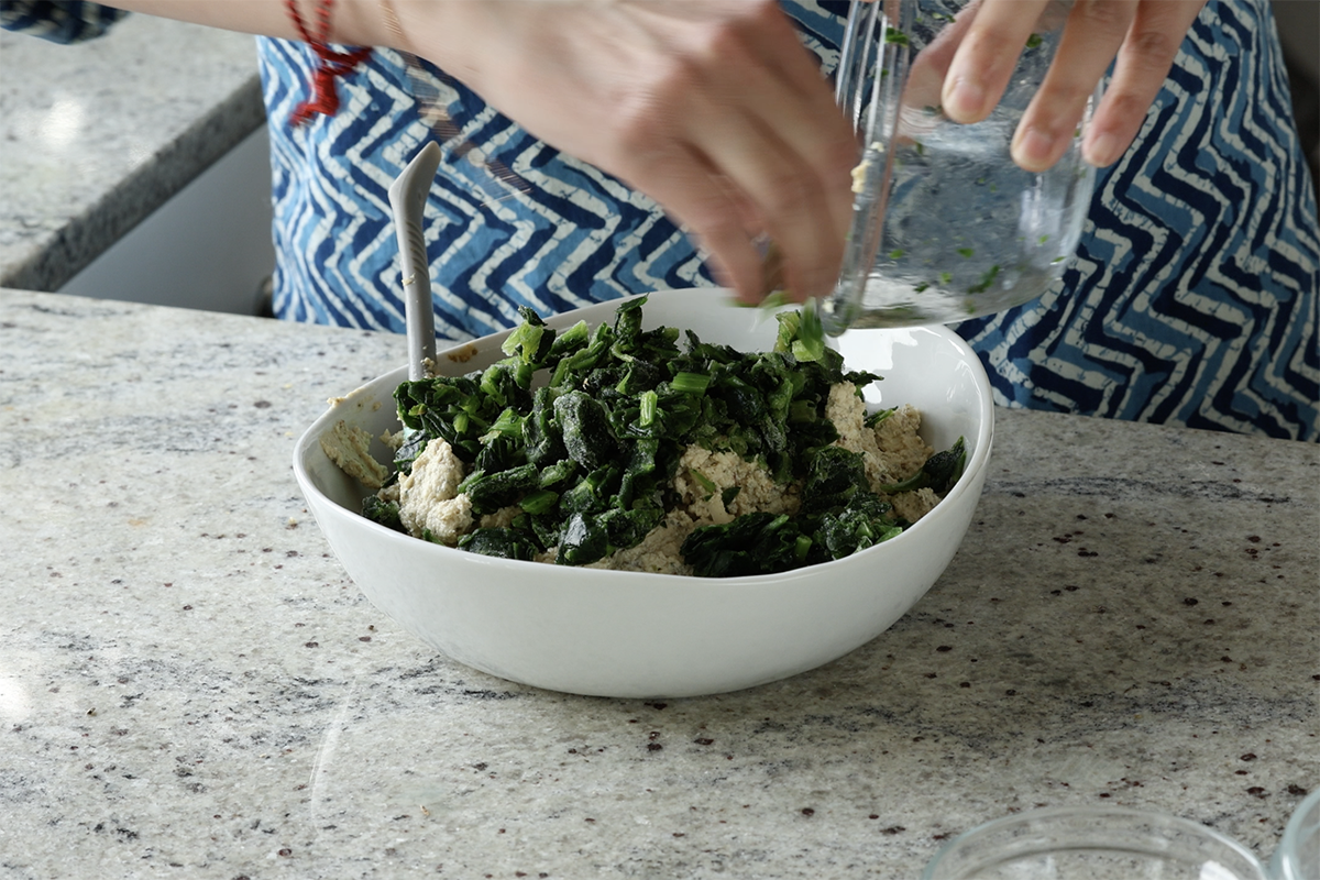 adding spinach to the tofu ricotta