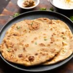 chickpea mushroom paratha on a plate
