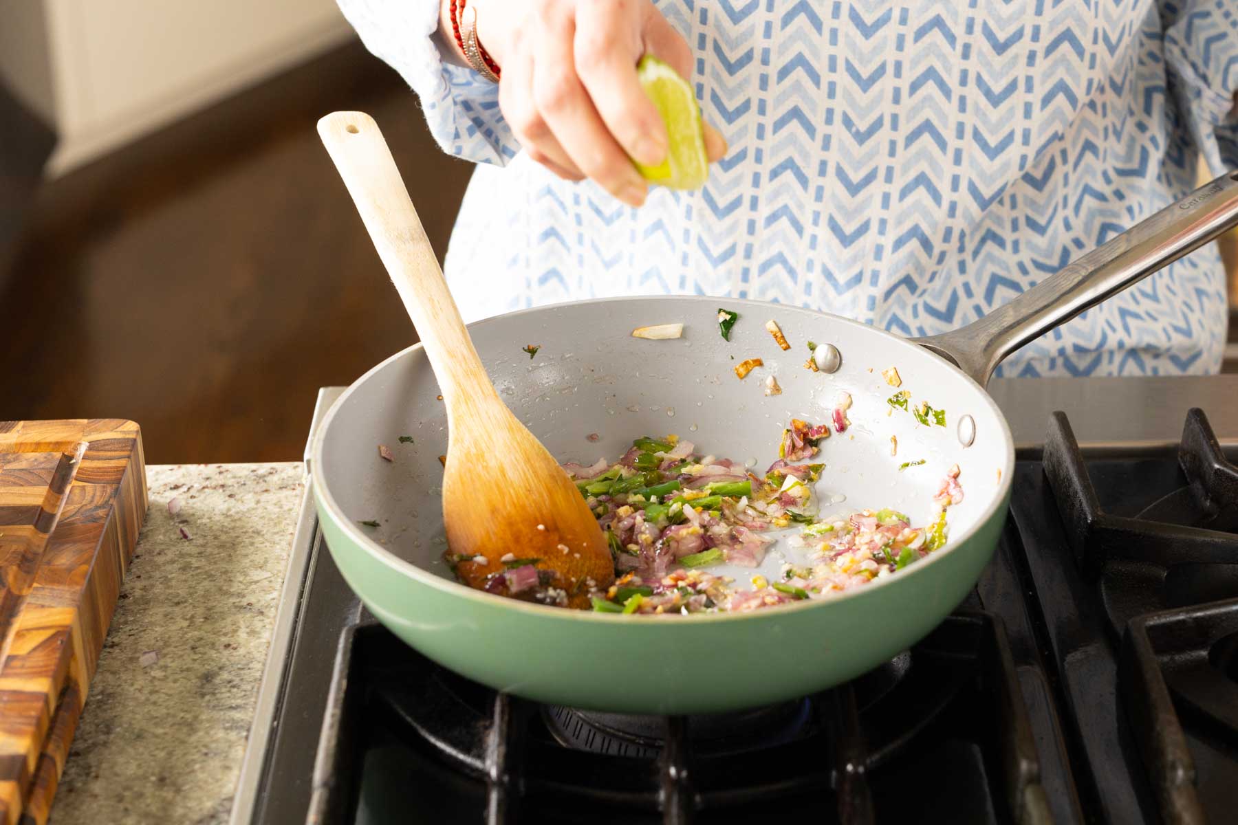 adding sauces to the pan