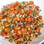 marinated white bean salad in a serving bowl