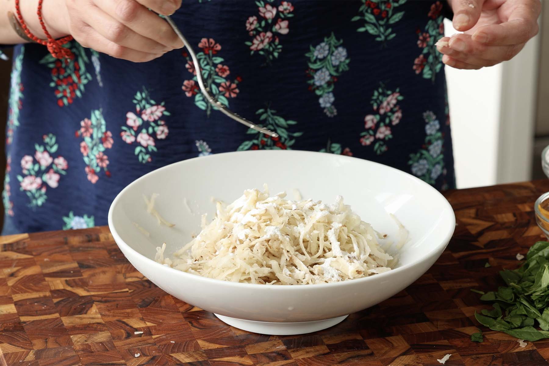 adding cornstarch to the potatoes