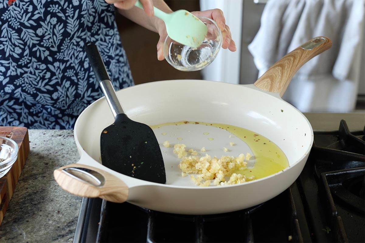garlic in the pan before cooking